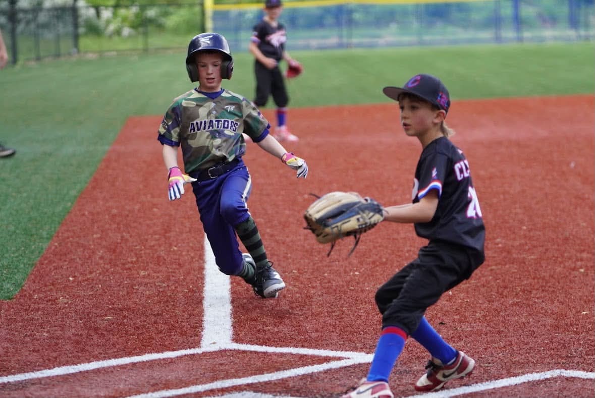 A CT Aviators baserunner scoring at home plate